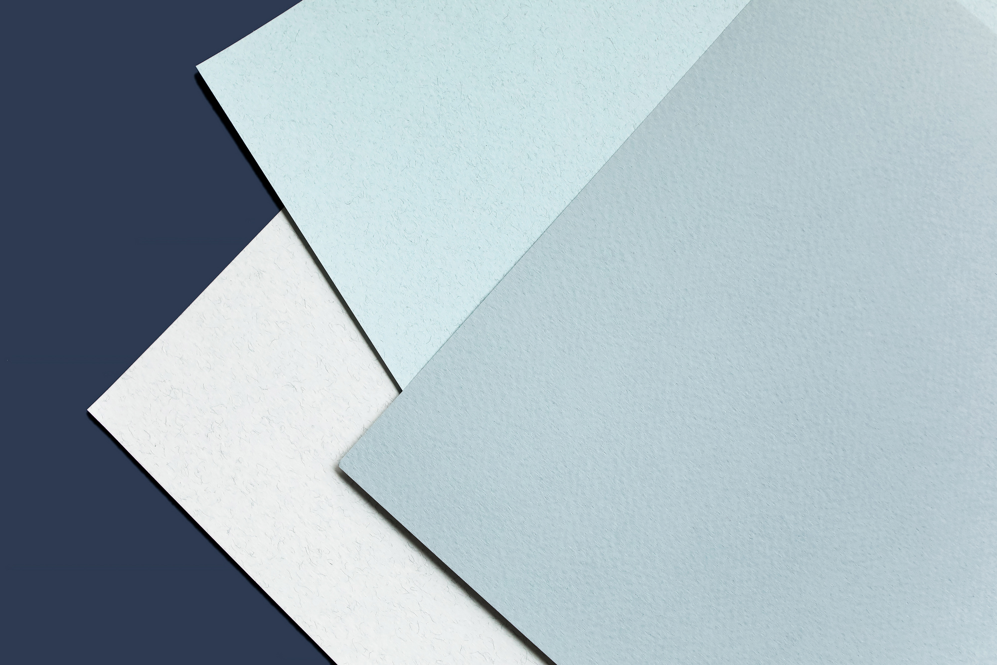 Shades of Blue Papers on Blue Background